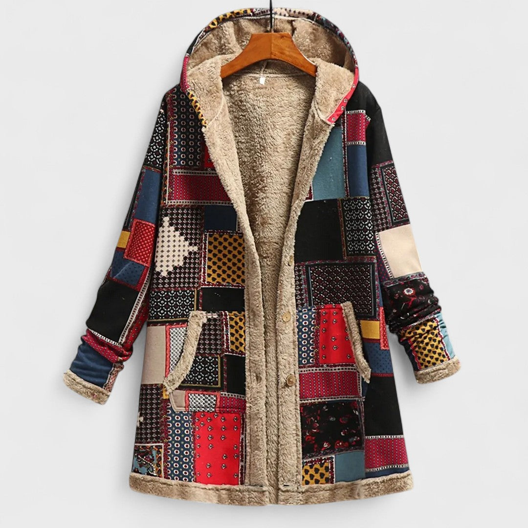 Patchwork coat with fur lining on a white background