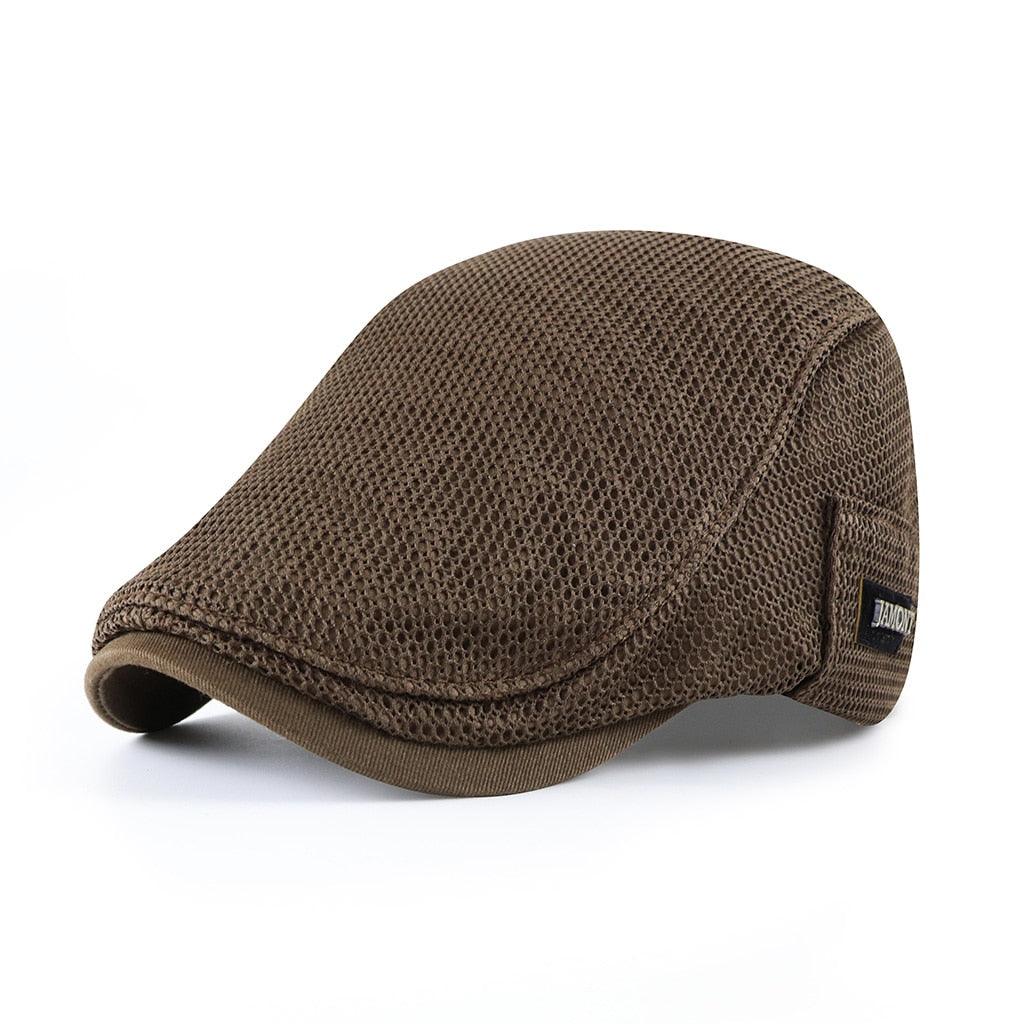 Brown knit cap on a white background