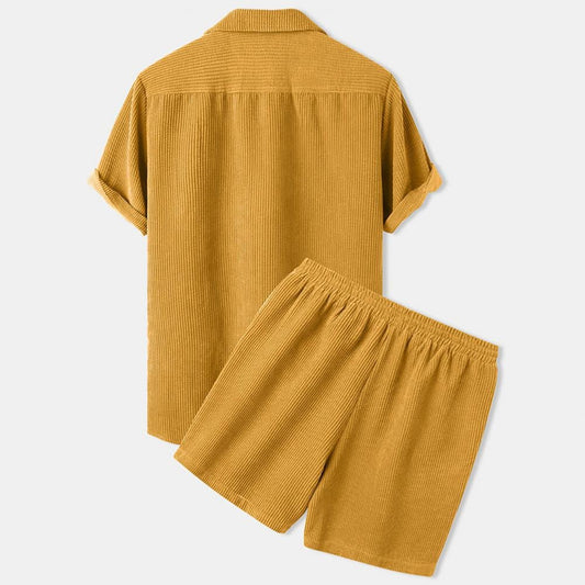 Yellow ribbed shirt and shorts set on a light gray background