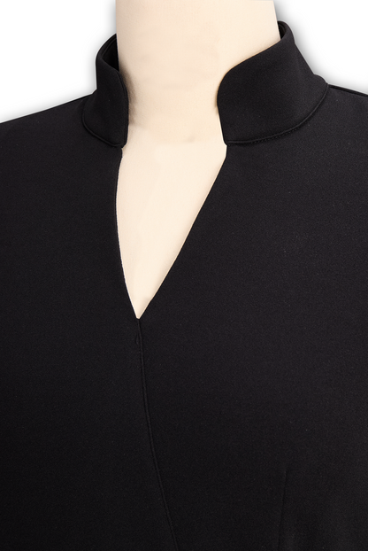 Black dress with a high neckline on a mannequin
