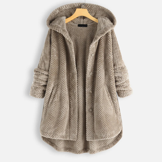 Beige hooded coat on a hanger against a white background