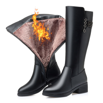 Black rain boots with flame design on a white background