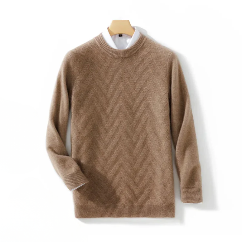 Brown sweater with a zigzag pattern on a hanger against a white background