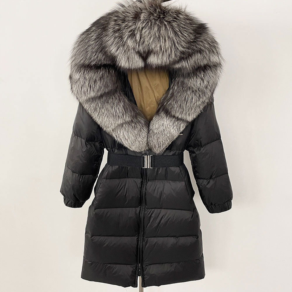 Black puffer coat with a large fur hood on a white background