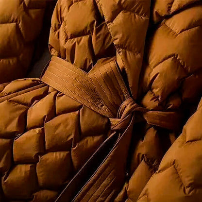 Close-up of a brown puffer jacket with a belt
