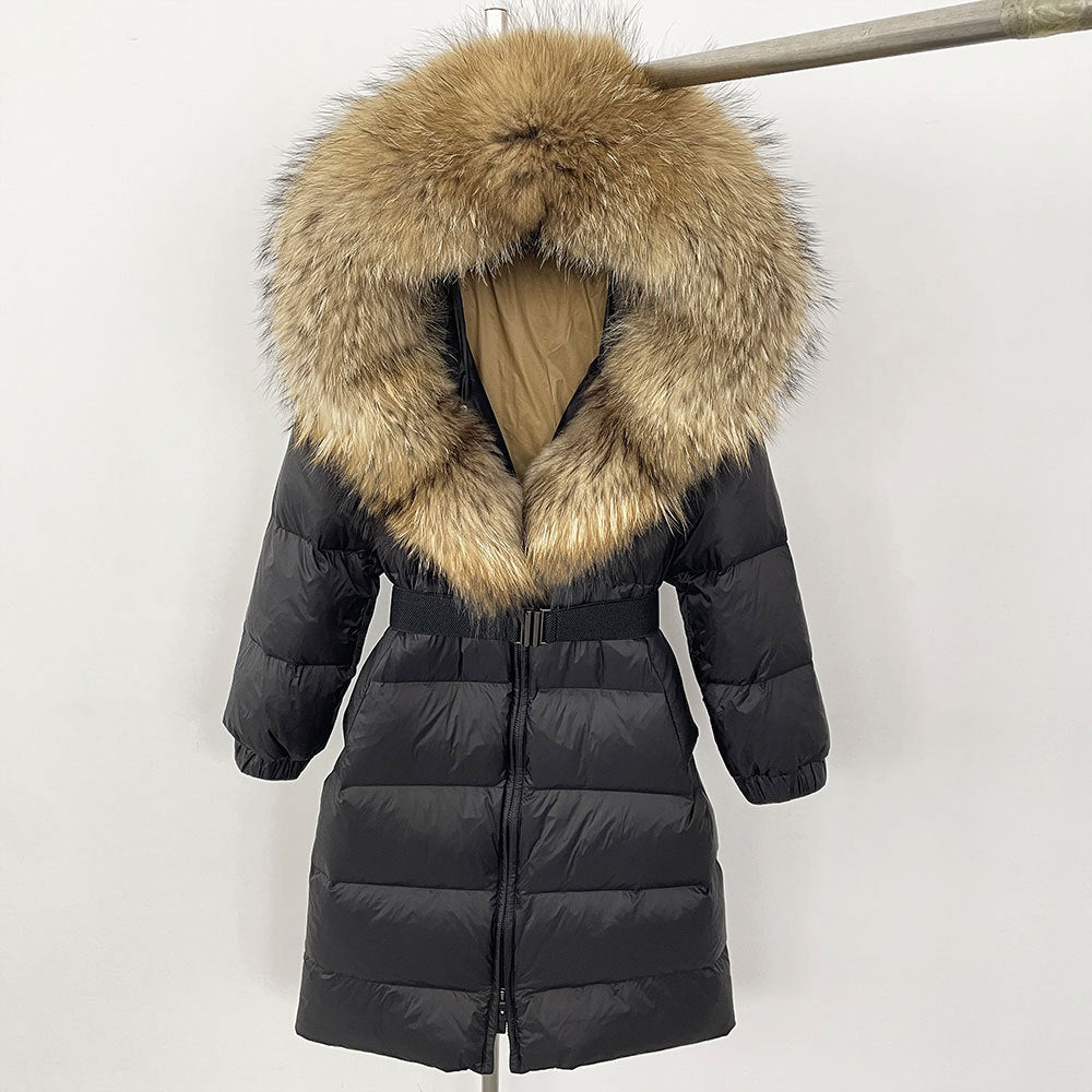 Black puffer coat with a large fur hood on a white background