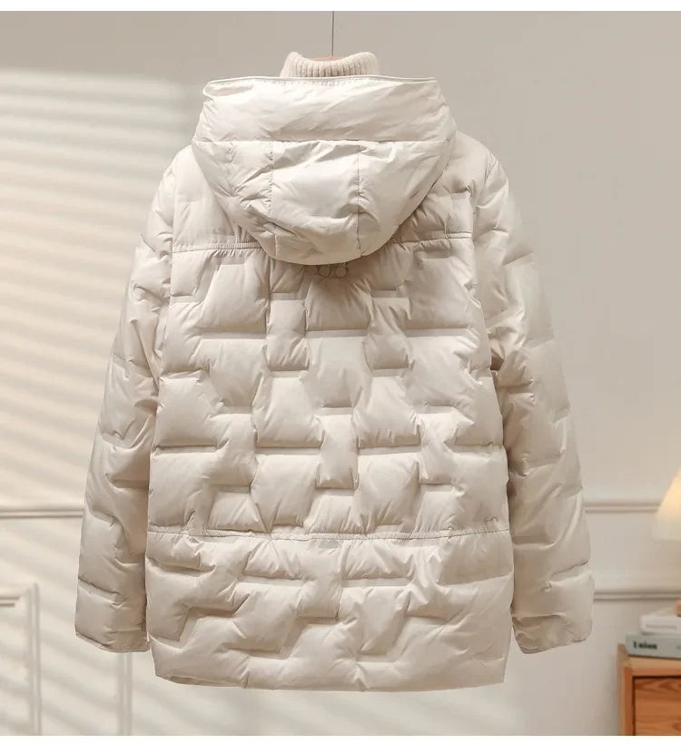 White puffer jacket with a hood on a light gray background