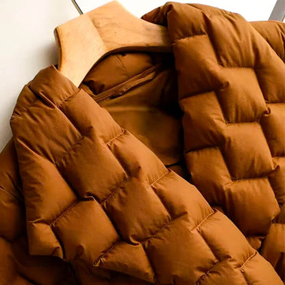 Brown puffer jacket on a white background