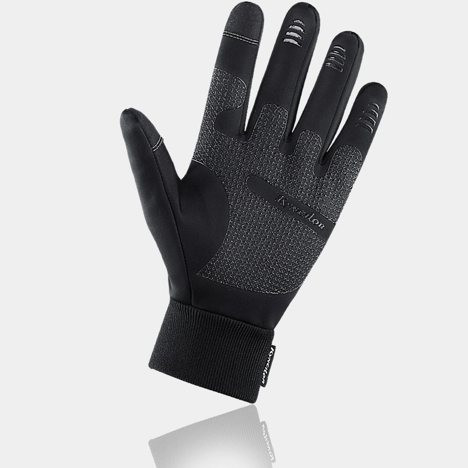 Black glove with touchscreen tips on a light gray background