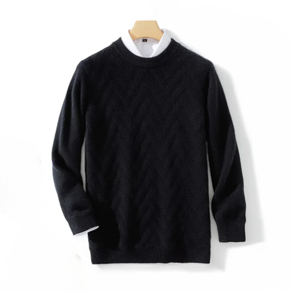 Black sweater on a wooden hanger against a white background