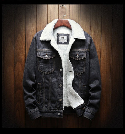 Denim jacket with white fur lining on a wooden background