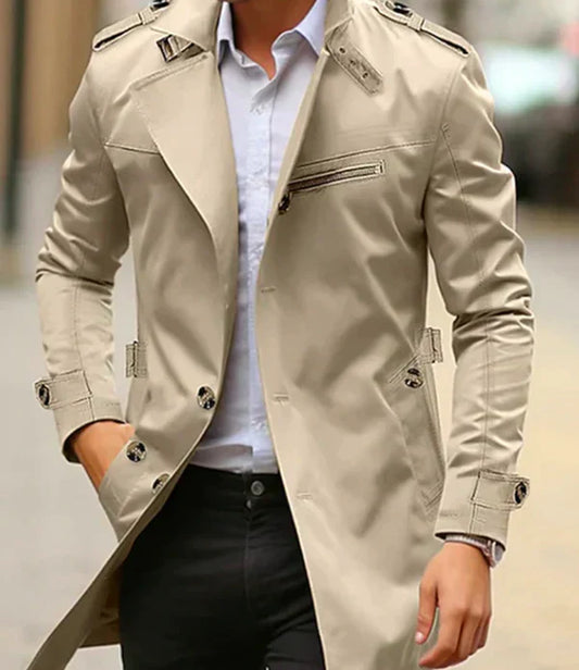 Beige trench coat worn by a person with a blurred background