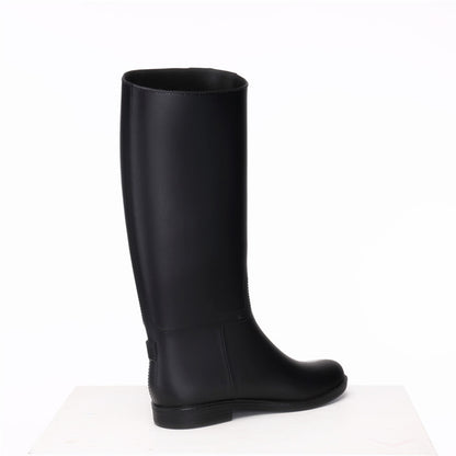 Black knee-high boot on a white background