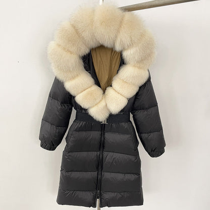 Black puffer coat with a large fur hood on a white background