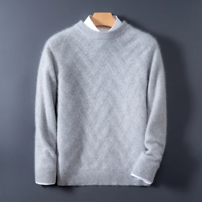 Gray sweater on a hanger against a dark background