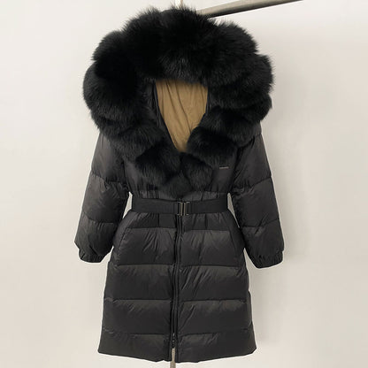 Black puffer coat with fur hood on a white background