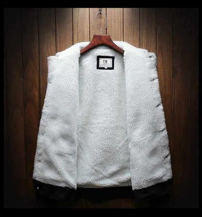 White fleece jacket on a wooden hanger against a wooden panel background