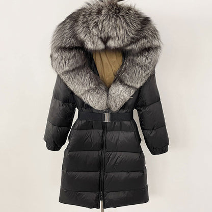 Black puffer coat with a large fur hood on a white background