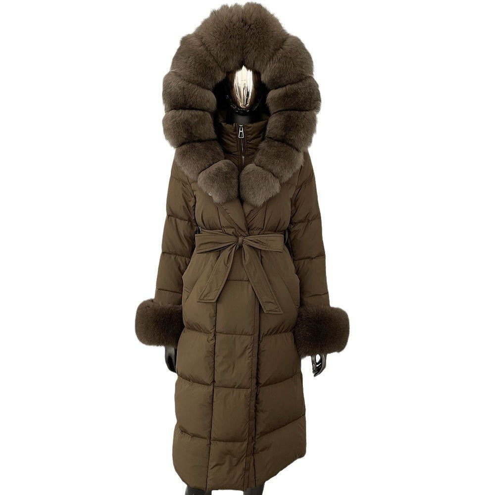 Brown puffer coat with fur trim on a white background