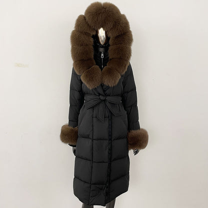 Black puffer coat with brown fur hood and cuffs on a white background