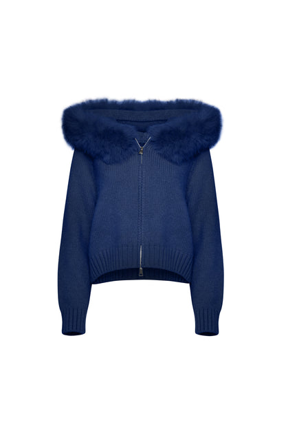Blue sweater with fur hood on a white background