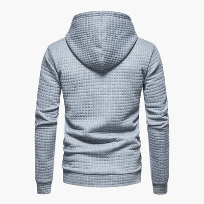 Light blue textured hoodie on a white background