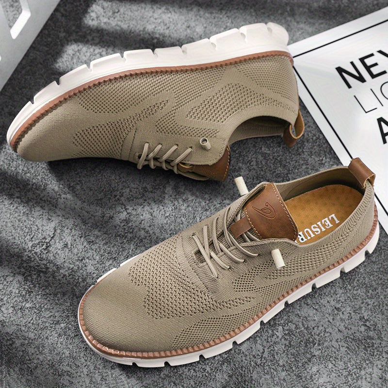 Beige casual shoes with brown accents on a gray surface