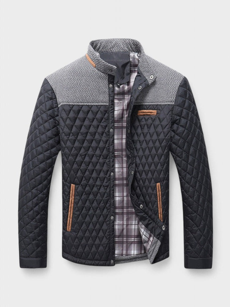 Quilted jacket with plaid lining on a light gray background