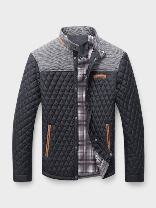 Quilted jacket with plaid lining on a light gray background