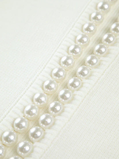 Close-up of a row of pearls on a white background