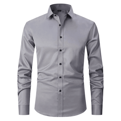 Gray dress shirt with black buttons on a white background