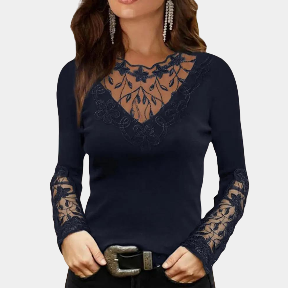 Navy blue long-sleeve top with lace detailing on a plain background