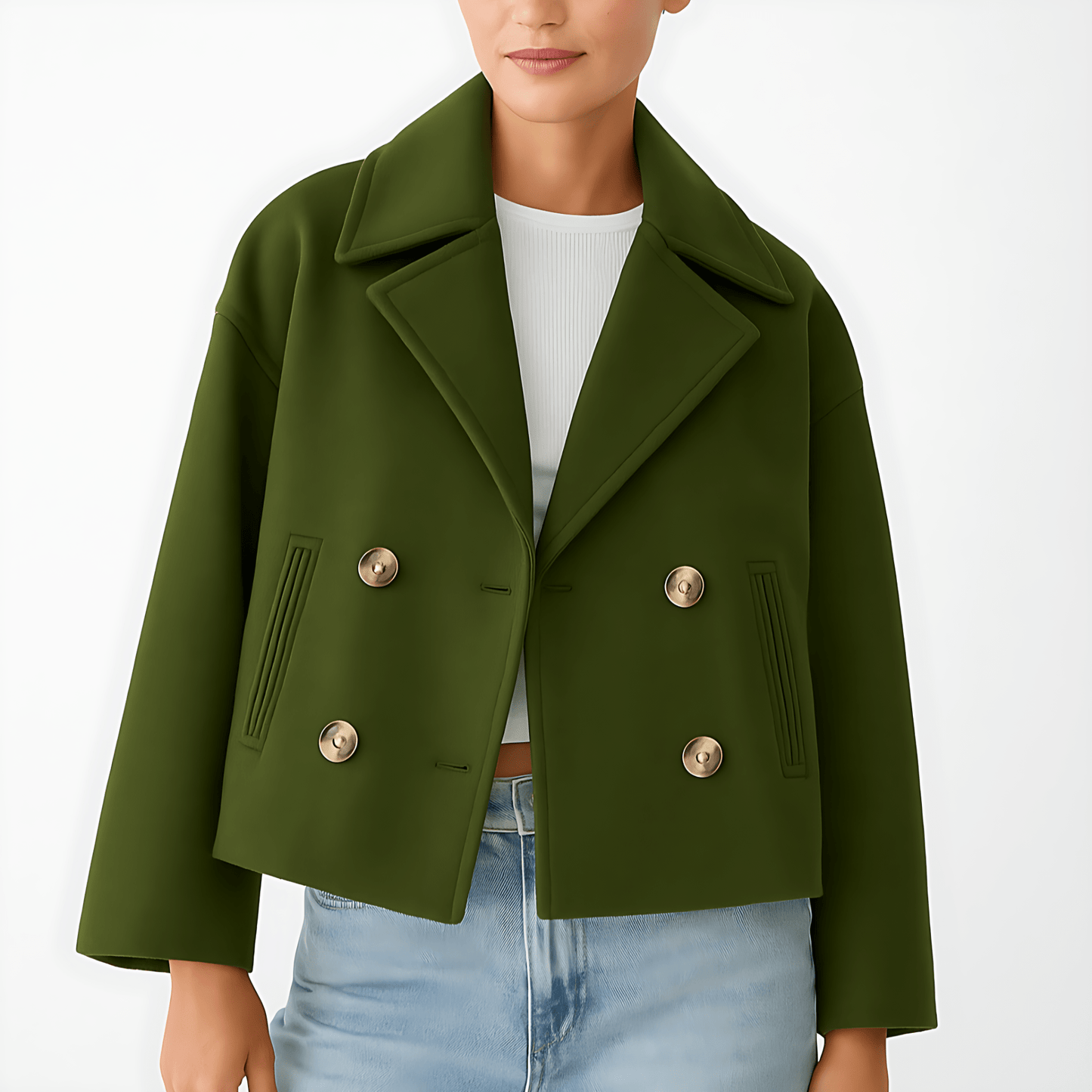 Green jacket with double-breasted buttons worn by a person on a white background