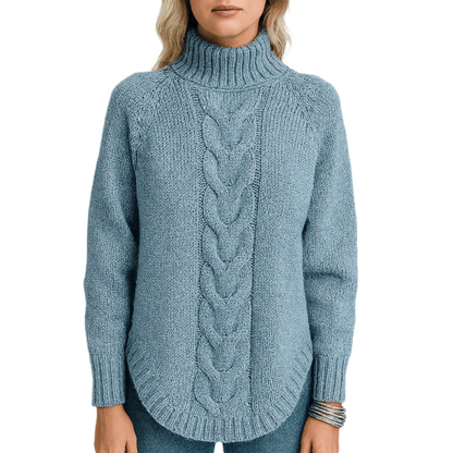 Blue knitted sweater with cable pattern on a white background