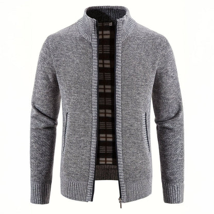 Gray knitted cardigan with plaid lining on a white background