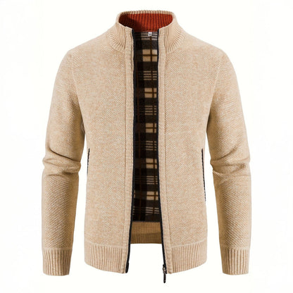 Beige cardigan with plaid lining on a white background