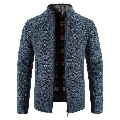 Blue knitted cardigan on a white background