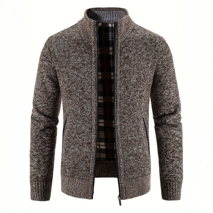 Gray knitted cardigan with plaid lining on a white background