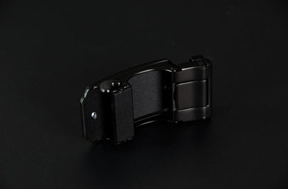 Black belt buckle on a black background
