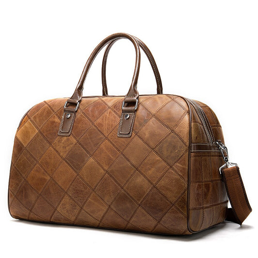 Brown quilted leather bag on a white background
