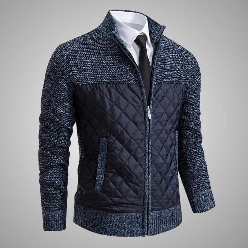Blue quilted jacket with a white shirt and black tie on a gray background