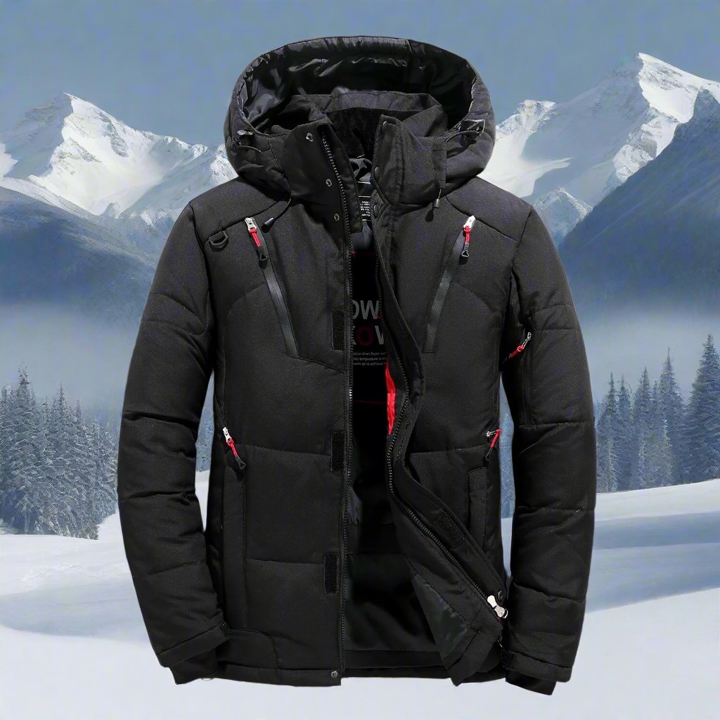 Black winter jacket with red accents on a snowy mountain background
