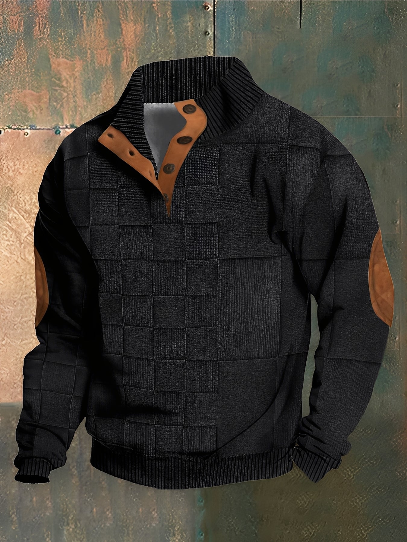Black sweater with brown accents on a textured background