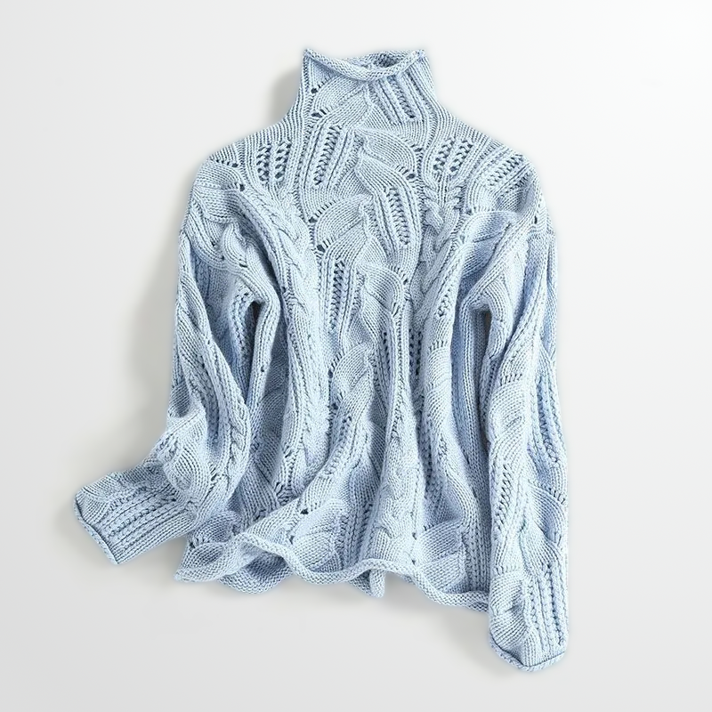 Light blue knitted sweater on a white background