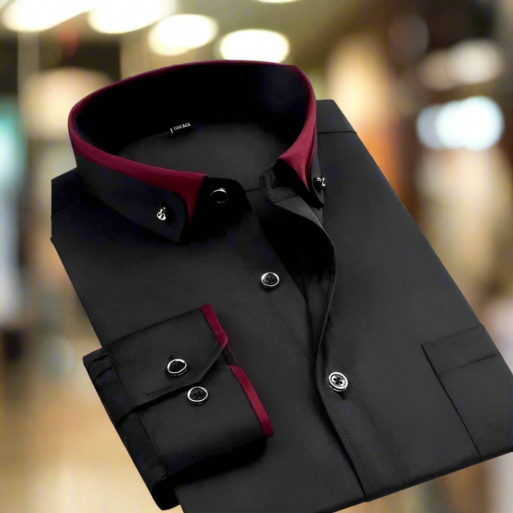 Black shirt with red collar and cuffs on a blurred background