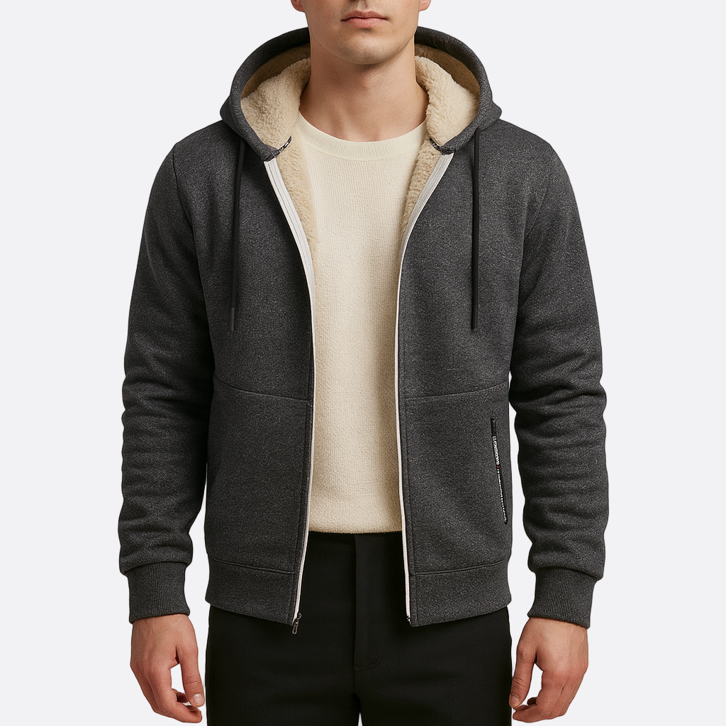 Person wearing a gray hoodie with a cream interior lining on a white background