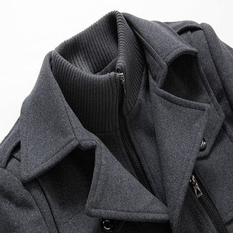Close-up of a gray coat with a zipper on a white background