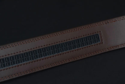 Close-up of a leather belt with a dark background