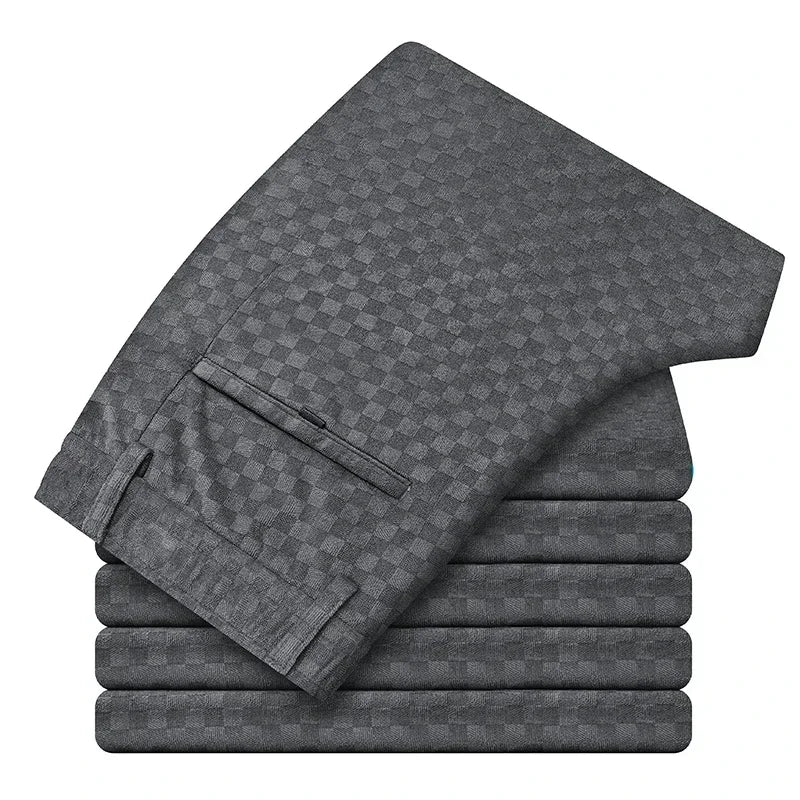 Stack of gray checkered towels on a white background