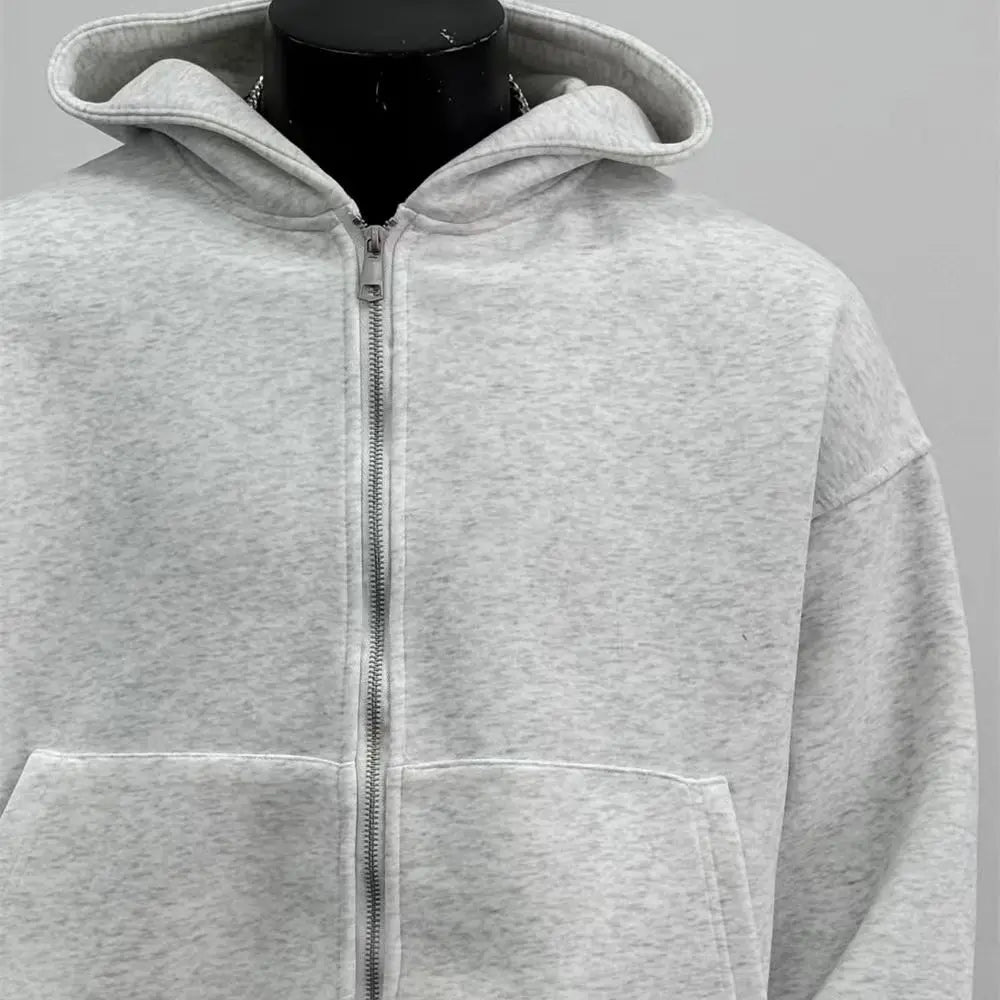 Gray hoodie on a mannequin against a gray background